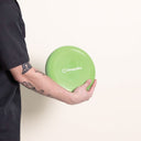 Frisbee en plastique recyclable arrondi